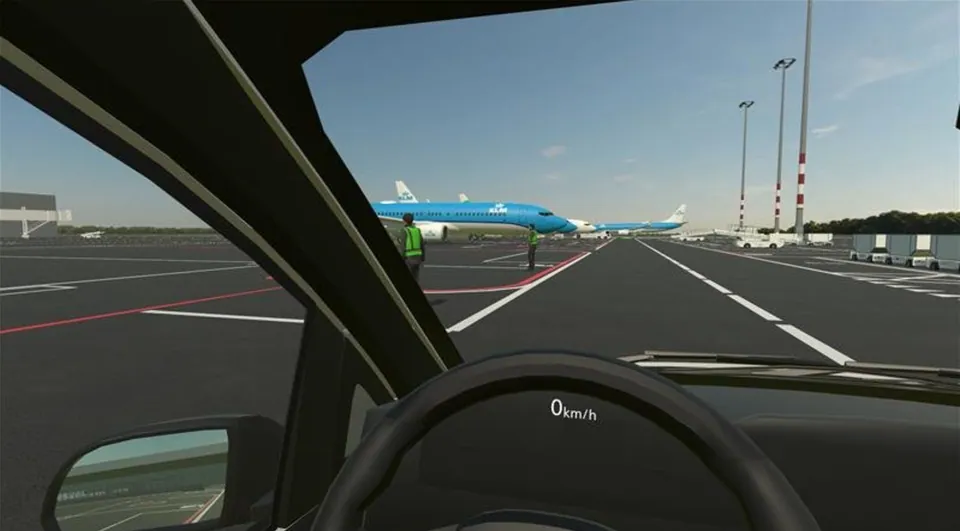 Schiphol VR Driving Simulator: zicht vanuit de cabine op een KLM-toestel en een platformmedewerker